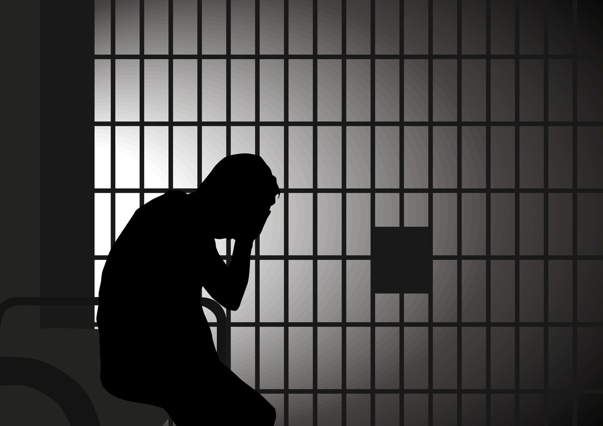 A graphic of a silhouette of a man in a jail cell in El Paso.